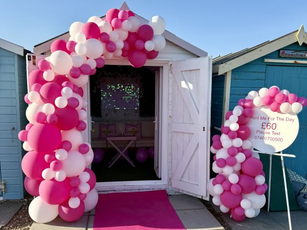 Pink Hut Exterior with celebration balloons