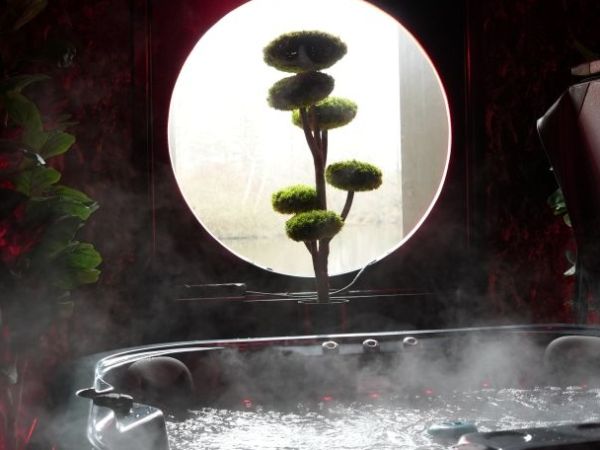 KOI hot tub with open shutter lake view