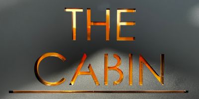 The Cabin Welcome Sign