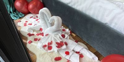 Towel Swans, Balloons and a sprinkling of rose petals