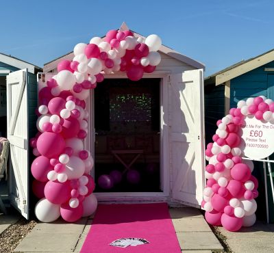 Pink Hut Exterior with celebration balloons