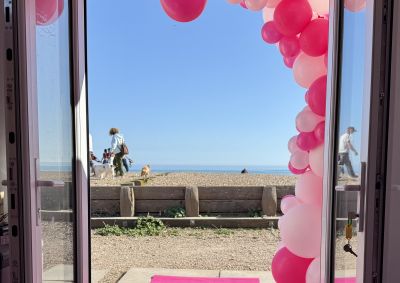 Pink Hut Exterior with celebration balloons
