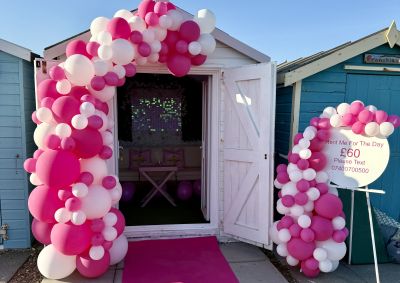Pink Hut Exterior with celebration balloons